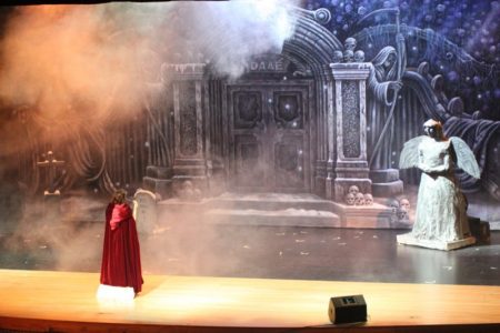 Student Performer as Christine in Park Hill South's Phantom of the Opera with Professional Daae's Cemetery Scenic Backdrop