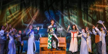 West Potomac HS-Spamalot-Dark-and-extremely-expensive-forest-backdrop-1 West Potomac High's Cast in front of TheatreWorld's Dark and Extremely Expensive Forest backdrop