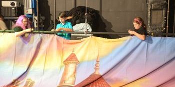 students hanging a backdrop at Largo Cultural Center Theatre Camp